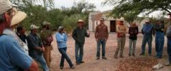 Participants review hands-on steps following greywater install.