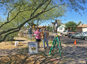 Volunteers help at a rain garden and tree pruning workshop at Primera Iglesia near downtown Phoenix, 2015.