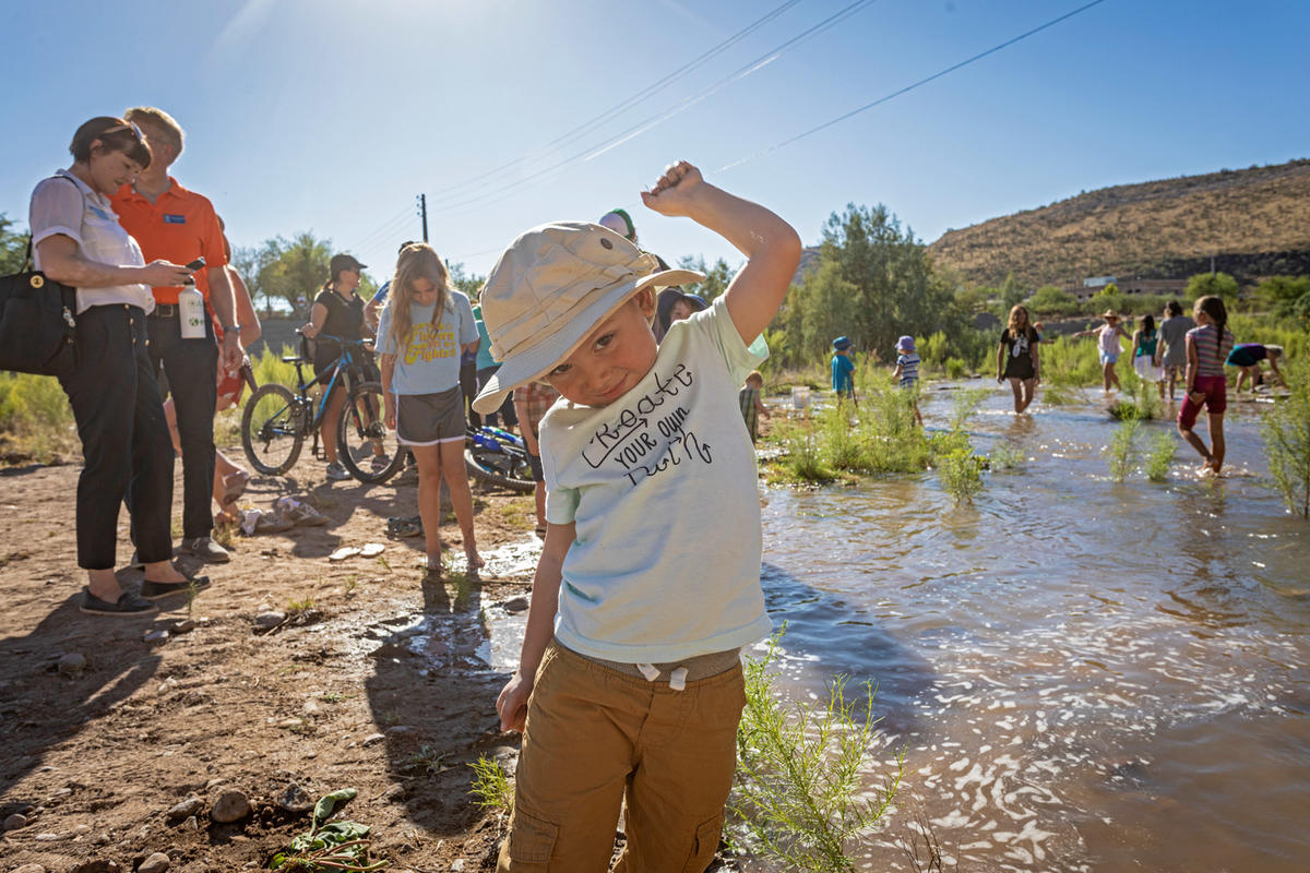 Child by the outflow water of the Santa Cruz River Heritage Project Child by the outflow water of the Santa Cruz River Heritage Project