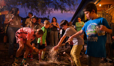 kids making a beaver dam at 8th annual beaverfest