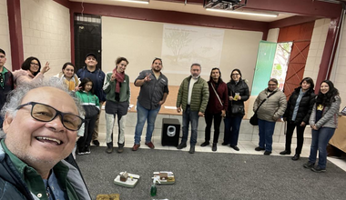 Joaquin from WMG takes a selfie with a dozen of the trainees in the background