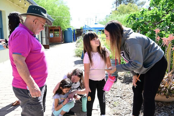 a family at an event at the living lab and learning center