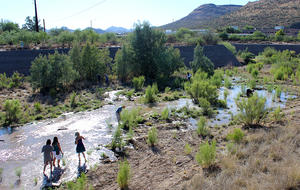 Tucsonans enjoying the waters flowing in the Santa Cruz River during the river release on Monday, June 24. Photo: Jamie Manser/Watershed Management Group 