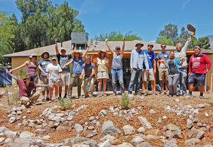 WMG Co-ops members celebrate a successful water-harvesting workshop.