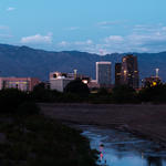The Santa Cruz and downtown Tucson at dusk. Photo by Julius Schlosburg