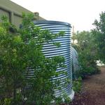 Rainwater harvesting systems such as this one at Jan Schwartz and Judith McDaniel’s home are part of the Homescape Harvest Tour.