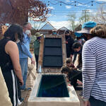 WMG Docent Dan Stormont gives a public tour of a 10,000-gallon cistern at the Living Lab.