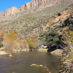 In this January 2015 file photo, Sabino Creek flows and forms pools in Sabino Canyon, with rock ridges towering above.