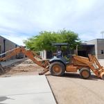Cienega High School water harvesting project - backhoe digging basins