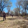 a pair of volunteers hike through a dry riverbed near tucson during the 3rd annual beaver survey